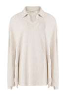 Light ivory Alfie Cape shirt by URA featuring a flowing design and soft fabric, displayed on a hanger.