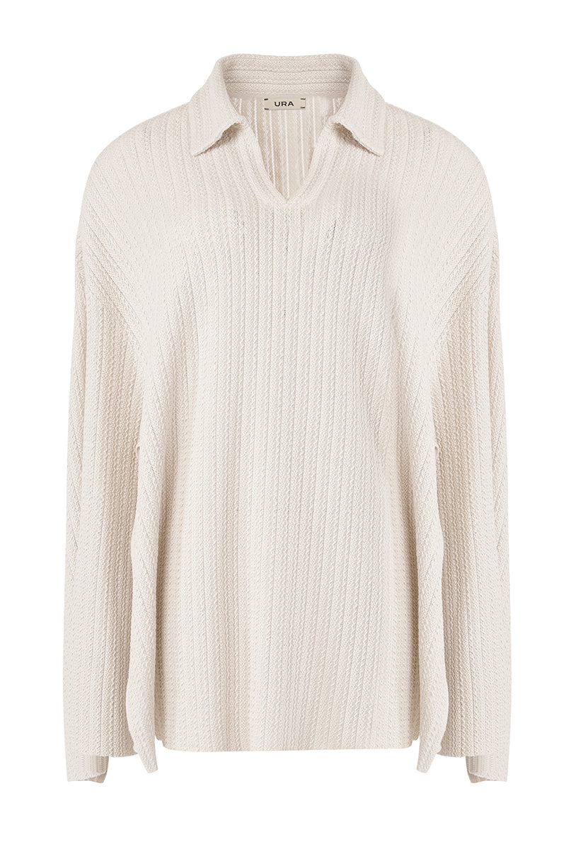 White ALFIE Cape shirt by URA, featuring a stylish ivory design with draped fabric and elegant detailing.