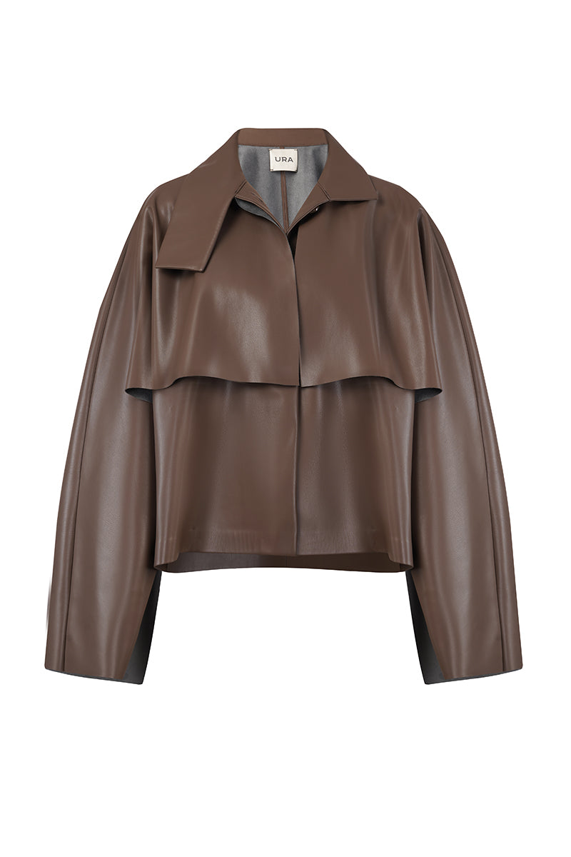 URA PIA trench jacket in classic style, featuring a tailored fit and button details, shown in a neutral color.