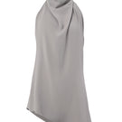 URa TUVA top shown in a close-up image, featuring stylish design and fabric details of this trendy women's top.