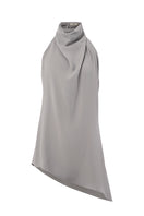 URa TUVA top shown in a close-up image, featuring stylish design and fabric details of this trendy women's top.