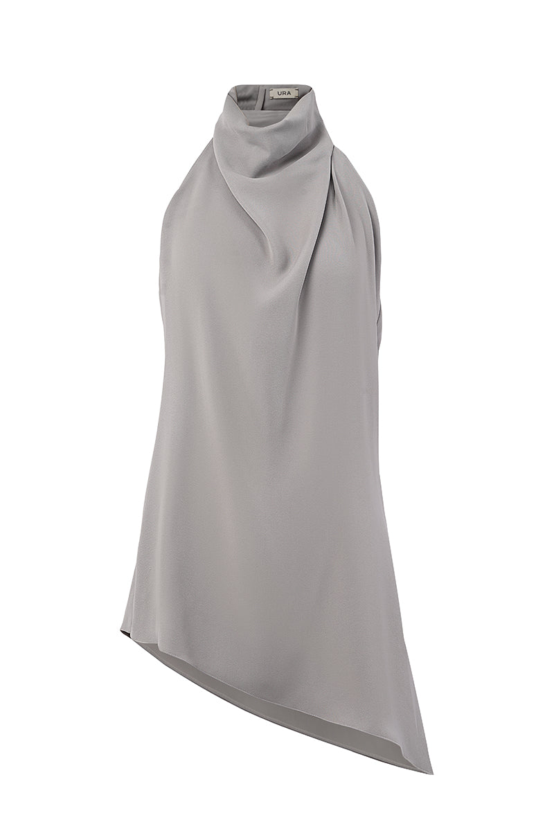 URa TUVA top shown in a close-up image, featuring stylish design and fabric details of this trendy women's top.