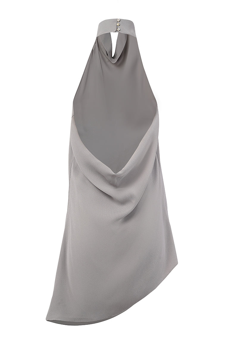 URa TUVA top shown on a model, featuring a stylish, lightweight blouse with long sleeves and a relaxed fit.