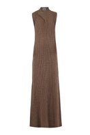 URa ALVA maxi dress featuring a flowing silhouette and elegant design, shown on a model with a soft, neutral background.