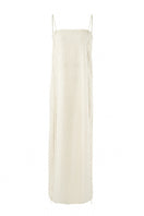 Off-white Laura tunic top by URA, featuring a relaxed fit with long sleeves and a stylish, casual design.