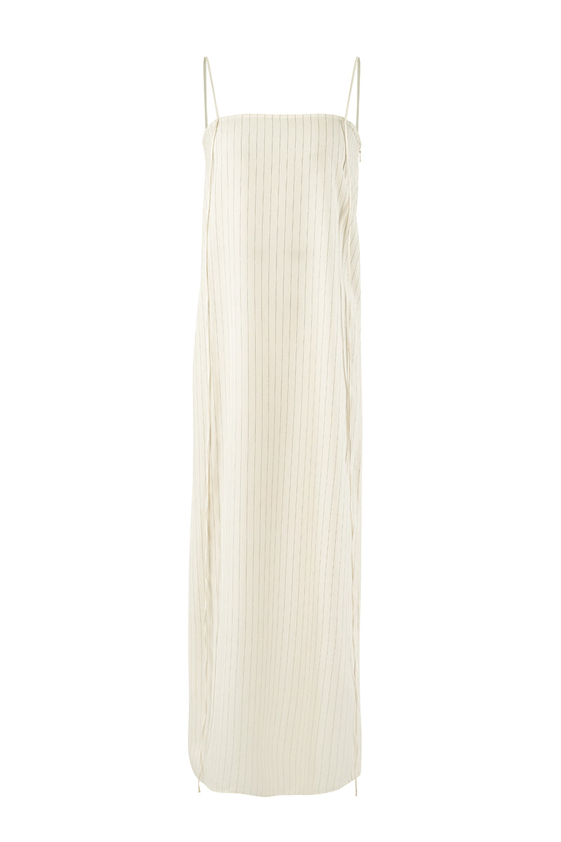 Off-white Laura tunic top by URA, featuring a relaxed fit with long sleeves and a stylish, casual design.