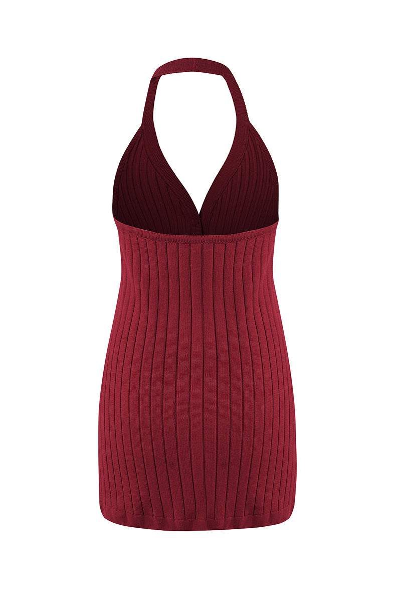 URA EMI TOP, stylish women’s blouse with intricate details, displayed on a hanger against a neutral background.