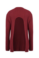 Cream knitwear top by URA, featuring a cozy, textured design and a relaxed fit, perfect for casual or layered outfits.