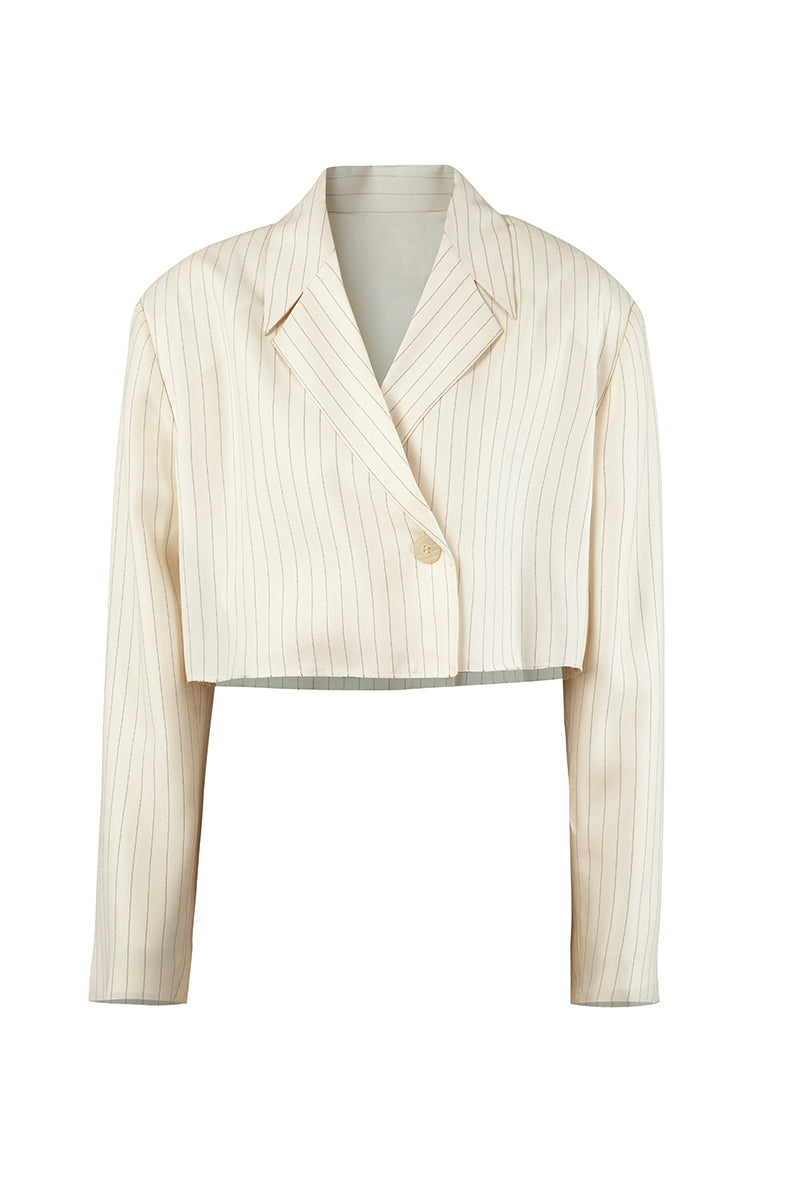 Off-white Laura blazer by URA, stylish jacket with tailored fit and classic lapel, displayed on a neutral background.