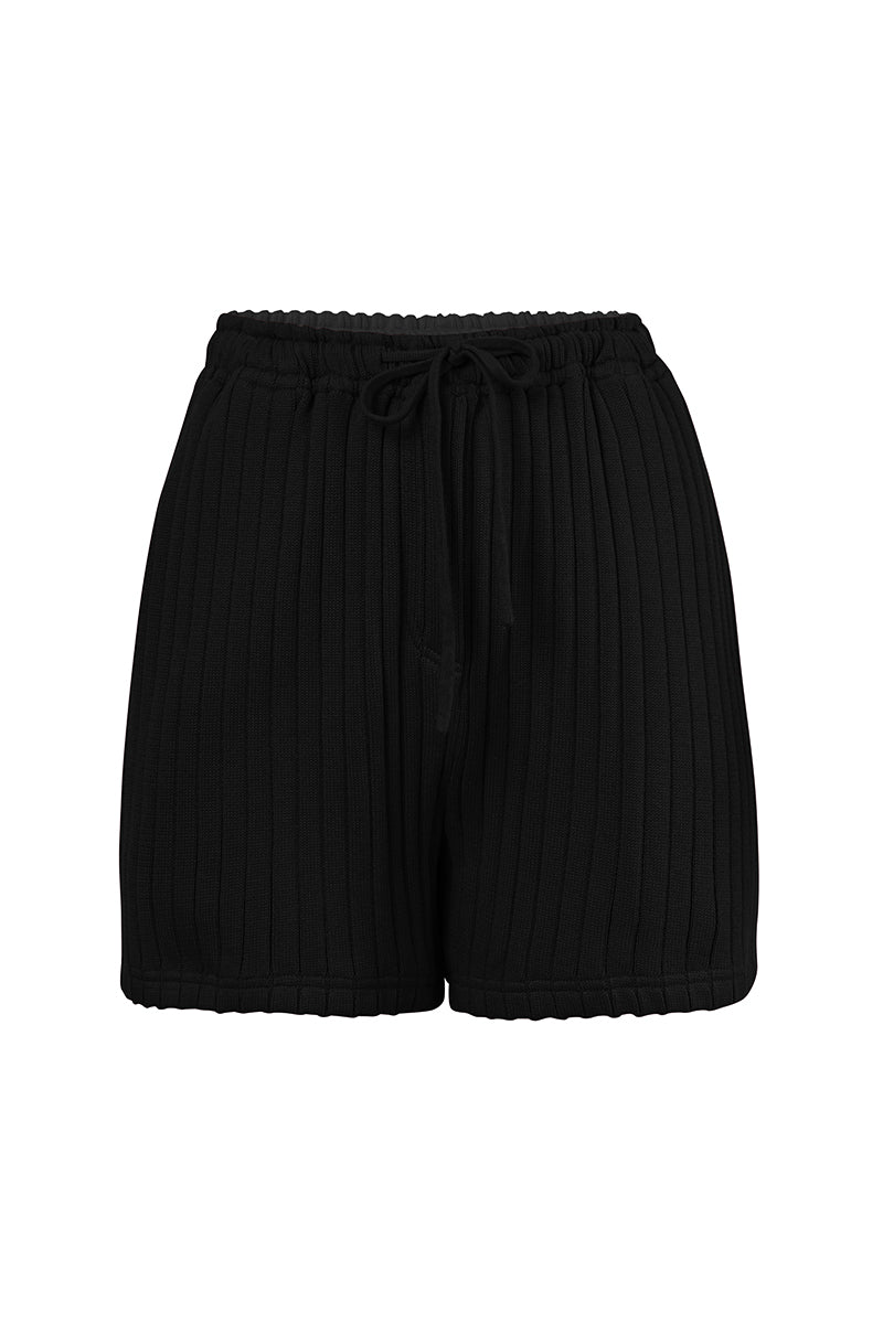 URA Morgan Shorts in beige with side pockets, casual fit, lightweight fabric, ideal for summer wear.