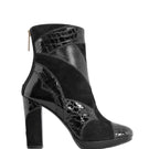 Claudia Black boots by Terry de Havilland featuring black leather with stylish design details.