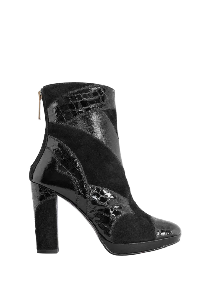 Claudia Black boots by Terry de Havilland featuring black leather with stylish design details.
