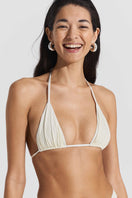 Seaquelle clean bikini top and reef bottom in pearl white, featuring a sleek, minimal design perfect for beachwear.