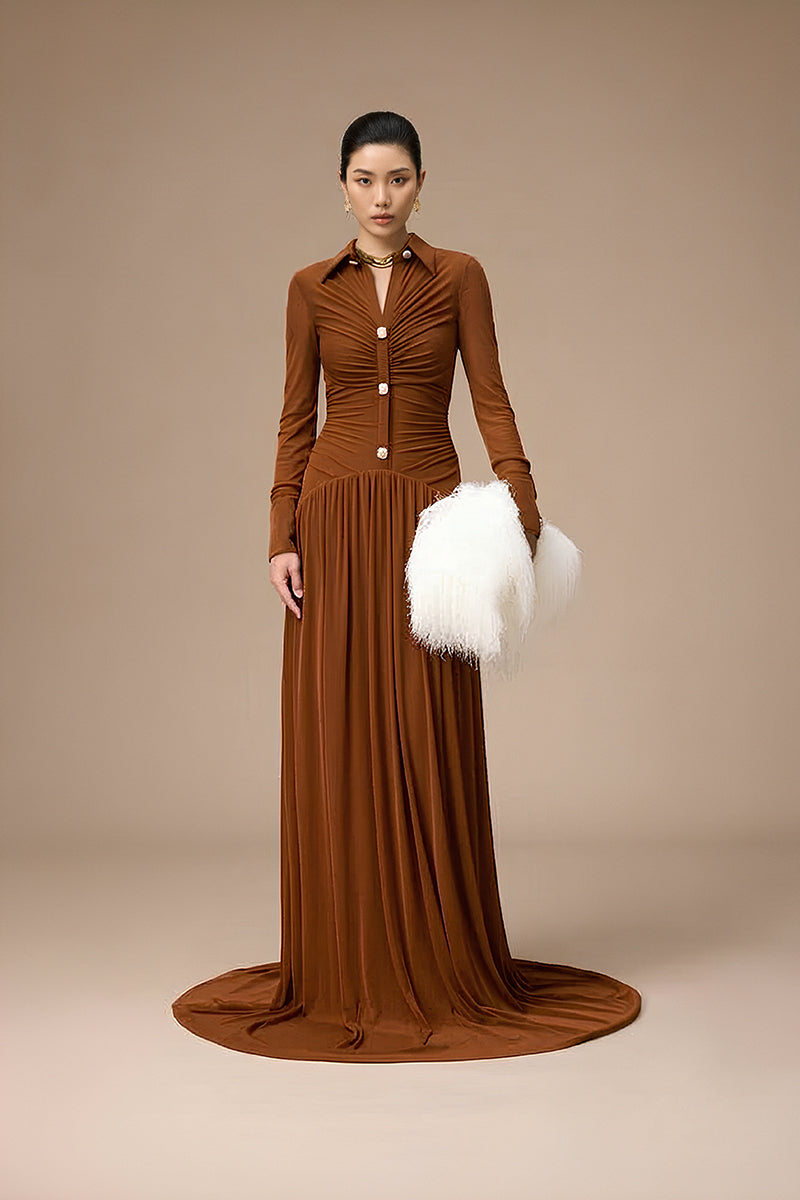 Jenny K Tran Clichy Dress in Ginger, a stylish gown with a flowing silhouette and warm ginger color, shown on a model.