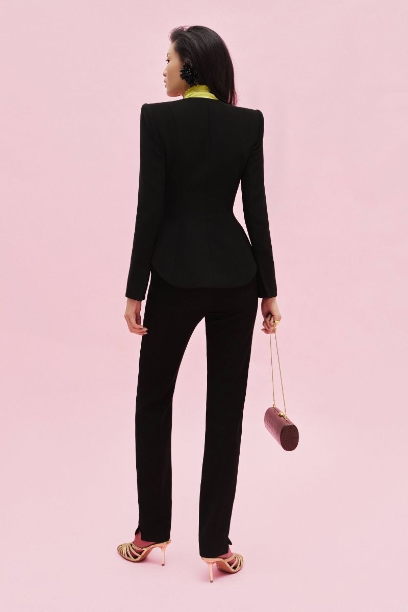 Jenny K Tran Clinton pants in black, tailored fit with side pockets, displayed on a neutral background.