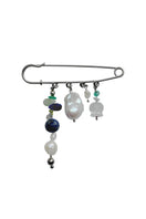 Colorful RIKO MIX STONES brooch by Aethera featuring multicolor stone accents on a decorative pin.