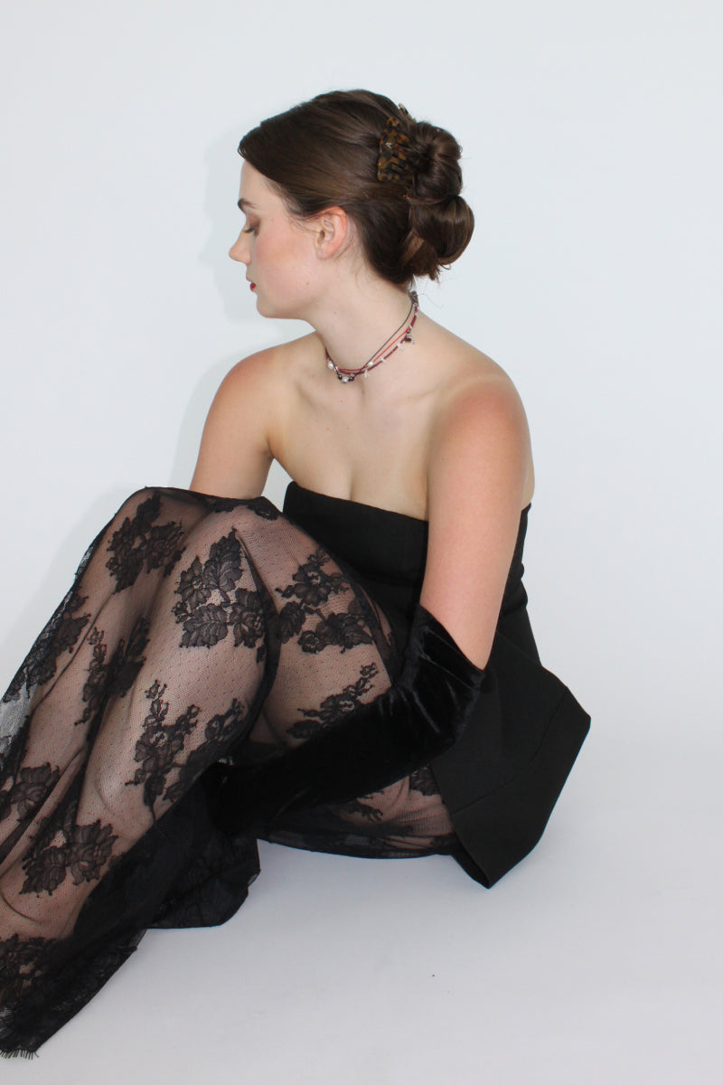 Aethera TUXI Garnet Clear Quartz Necklace featuring a red gemstone pendant on a delicate chain.