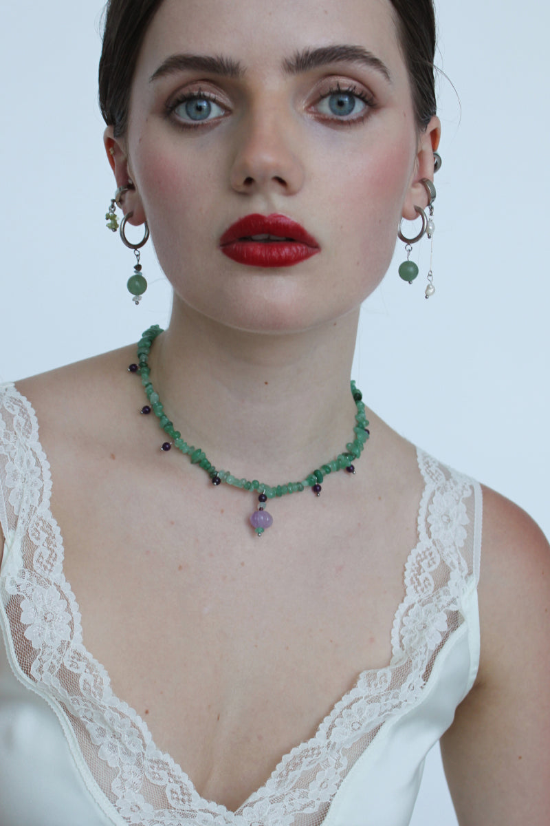 Aethera Blaine aventurine charm necklace featuring a vibrant green gemstone pendant on a delicate chain.