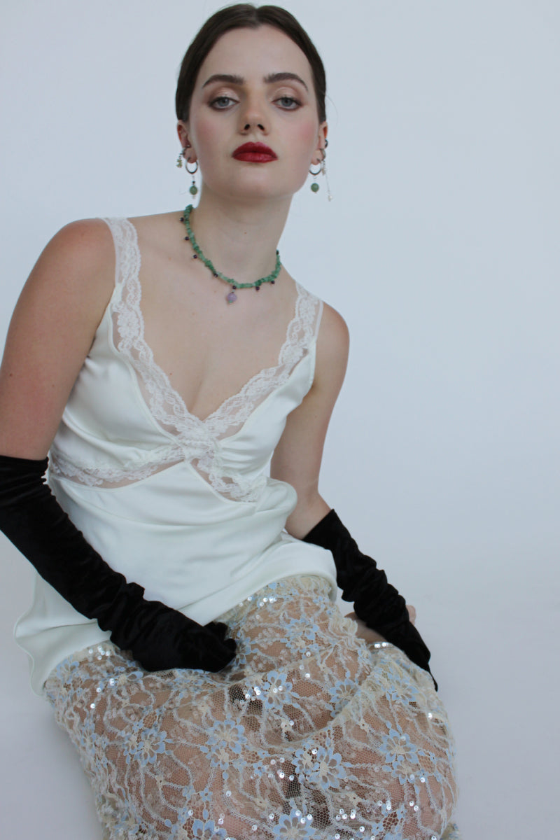 Aethera Blaine aventurine charm necklace featuring a green aventurine pendant on a delicate chain.