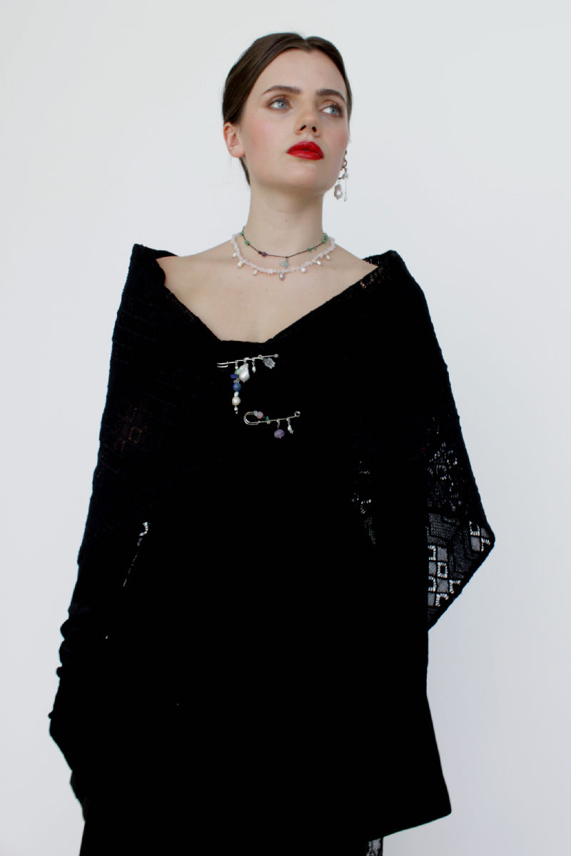 Black Aethera scarf with pearl-embellished embroidery, showcasing intricate broderie details and elegant fabric.