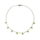 Aethera Catana Peridot and Serpentine necklace featuring green gemstones on a delicate chain.