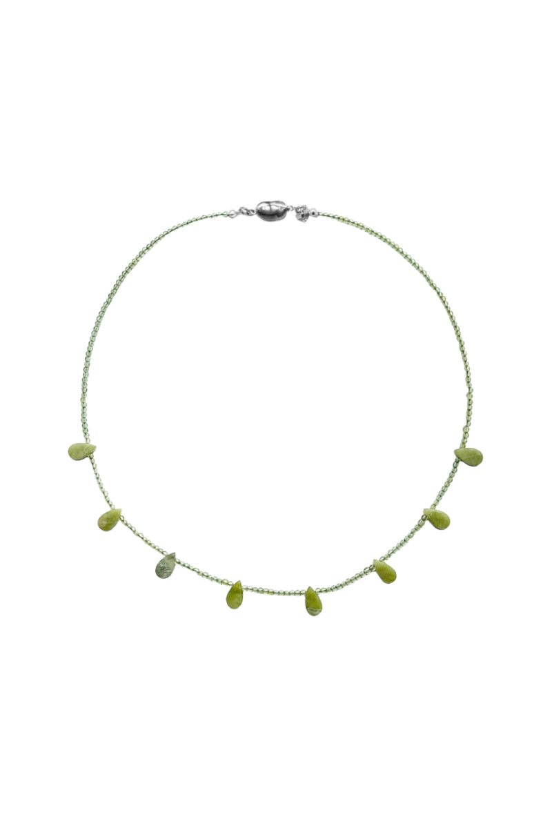 Aethera Catana Peridot and Serpentine necklace featuring green gemstones on a delicate chain.