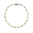 Aethera SORAIA Peridot Necklace in vibrant green with delicate chain and gemstone pendant, showcasing elegant jewelry craftsmanship.