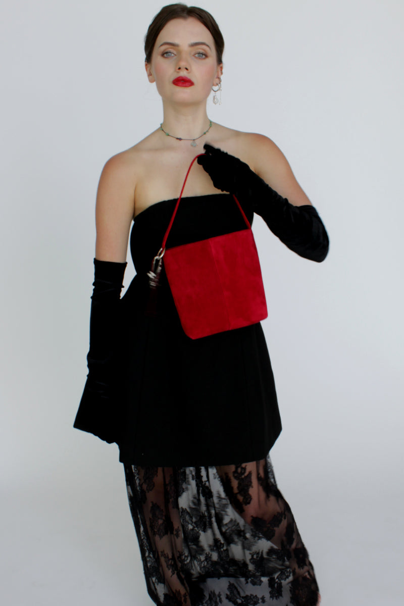 Red KAI Initial Bag Charm jewelry set by Aethera featuring a stylish initial pendant and complementary accessories.