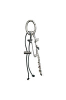 Aethera REN Initial Bag Charm in multicolor with intricate jewelry set design featuring vibrant, multicolored charms and metal accents.