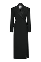 Tagg coat with a stylish side slit, featuring a tailored design and neutral color, perfect for a modern, elegant look.
