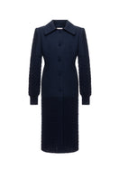 Long navy statement coat by Liya featuring a sleek, tailored design with a modern silhouette and full-length style.
