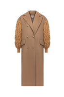 Liya dramatic camel knit-sleeve coat displayed on a hanger, featuring a cozy knit fabric and stylish design.