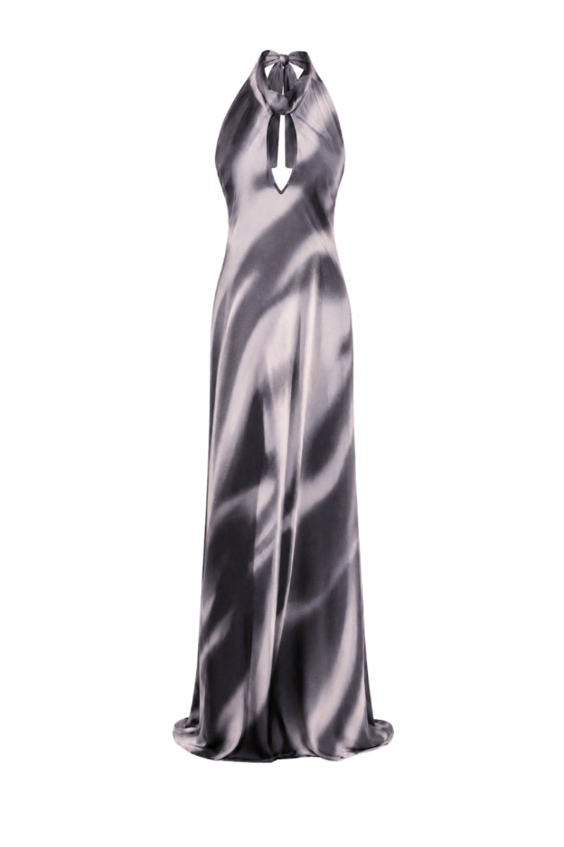 Black printed Cocoa maxi dress by Tinta Latina, featuring flowing fabric and elegant design, perfect for casual or dressy occasions.