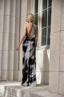 Black printed cocoa maxi dress by Tinta Latina, featuring a flowing silhouette and stylish design perfect for casual or semi-formal wear.