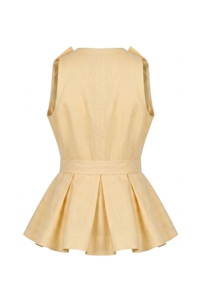 Yellow Magnolia blouse in butter yellow by ANA + MARIA, featuring a stylish top with a relaxed fit and elegant design.