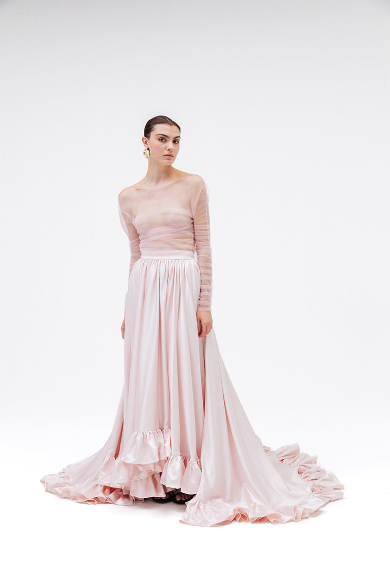 Pastel pink cotton candy top by Studio NK, featuring a soft, stylish design perfect for casual wear.