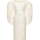 Liya dramatic knit belted white coat displayed on a hanger with a structured collar and long sleeves.