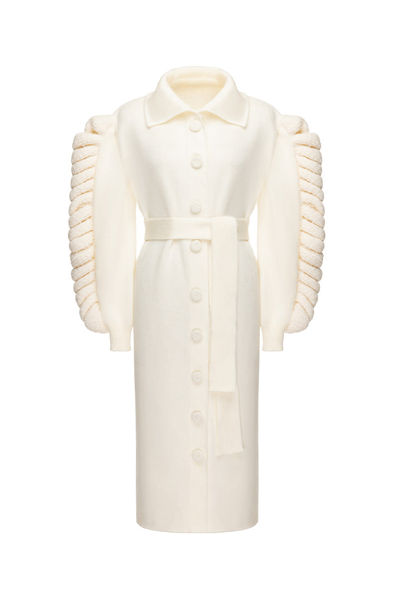Liya dramatic knit belted white coat displayed on a hanger with a structured collar and long sleeves.