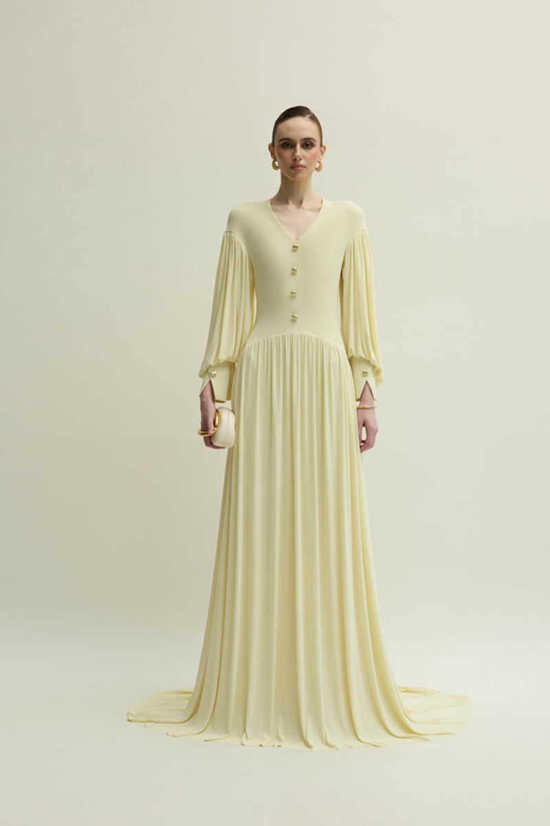 Yellow Cranley dress by Jenny K Tran, elegant gown with flowing fabric and detailed design, shown in a full-length view.