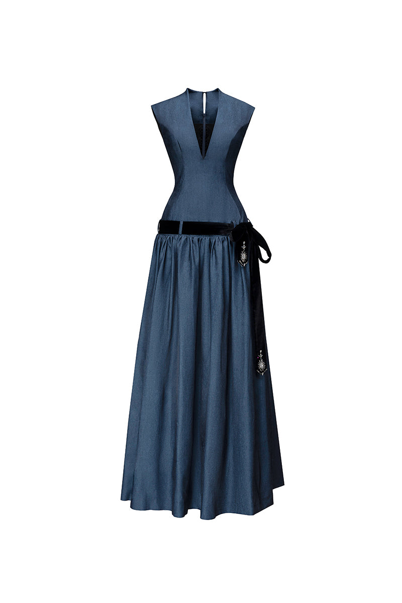 Dark blue Cricklade gown by Jenny K Tran, elegant evening dress with flowing fabric and refined design, perfect for formal occasions.