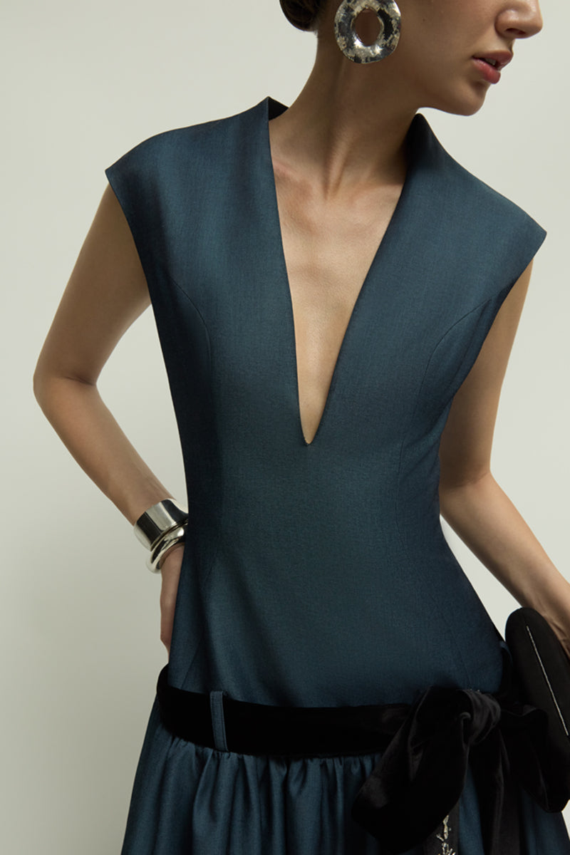 Jenny K Tran Cricklade dark blue gown with elegant design, featuring flowing fabric and sophisticated style.