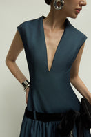 Jenny K Tran Cricklade dark blue gown with elegant design, featuring flowing fabric and sophisticated style.