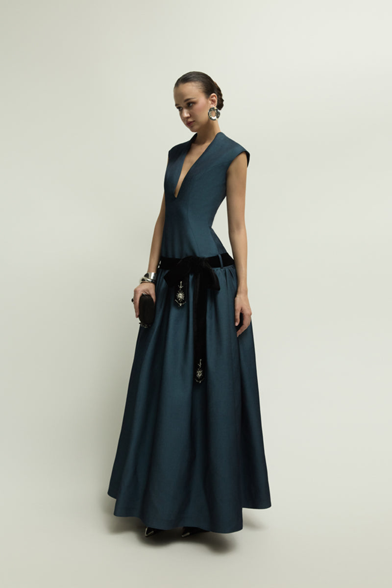Dark blue Cricklade dress by Jenny K Tran, elegant gown with flowing fabric and sophisticated design.