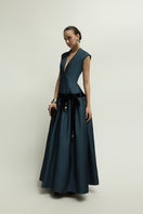 Dark blue Cricklade dress by Jenny K Tran, elegant gown with flowing fabric and sophisticated design.