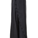 Black crossed leather pants by MAZ Manuela Álvarez, showcasing a stylish design with crossed leather panels and a sleek fit.