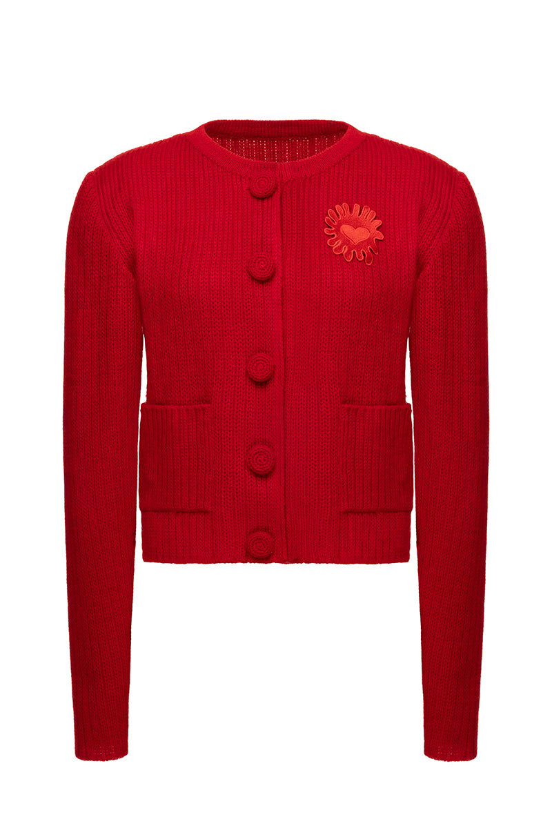 Red Liya cardigan with long sleeves and a cozy knit design, perfect for layered casual wear.