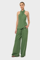 niLuu AQUAFLORA cross halter top in moss, stylish sleeveless blouse with tie straps and floral print, perfect for warm weather.