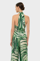 niLuu AQUAFLORA cross halter top in Rocco fabric, showcasing a stylish sleeveless design with a halter neckline and vibrant pattern.