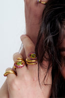 Sara & Flora burgundy spiral eye ring, silver jewelry featuring a unique coiled design with eye motif, stylish and elegant accessory.