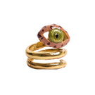 Sara & Flora terracotta spiral eye ring, showcasing a handcrafted copper ring with a spiral design and eye motif.